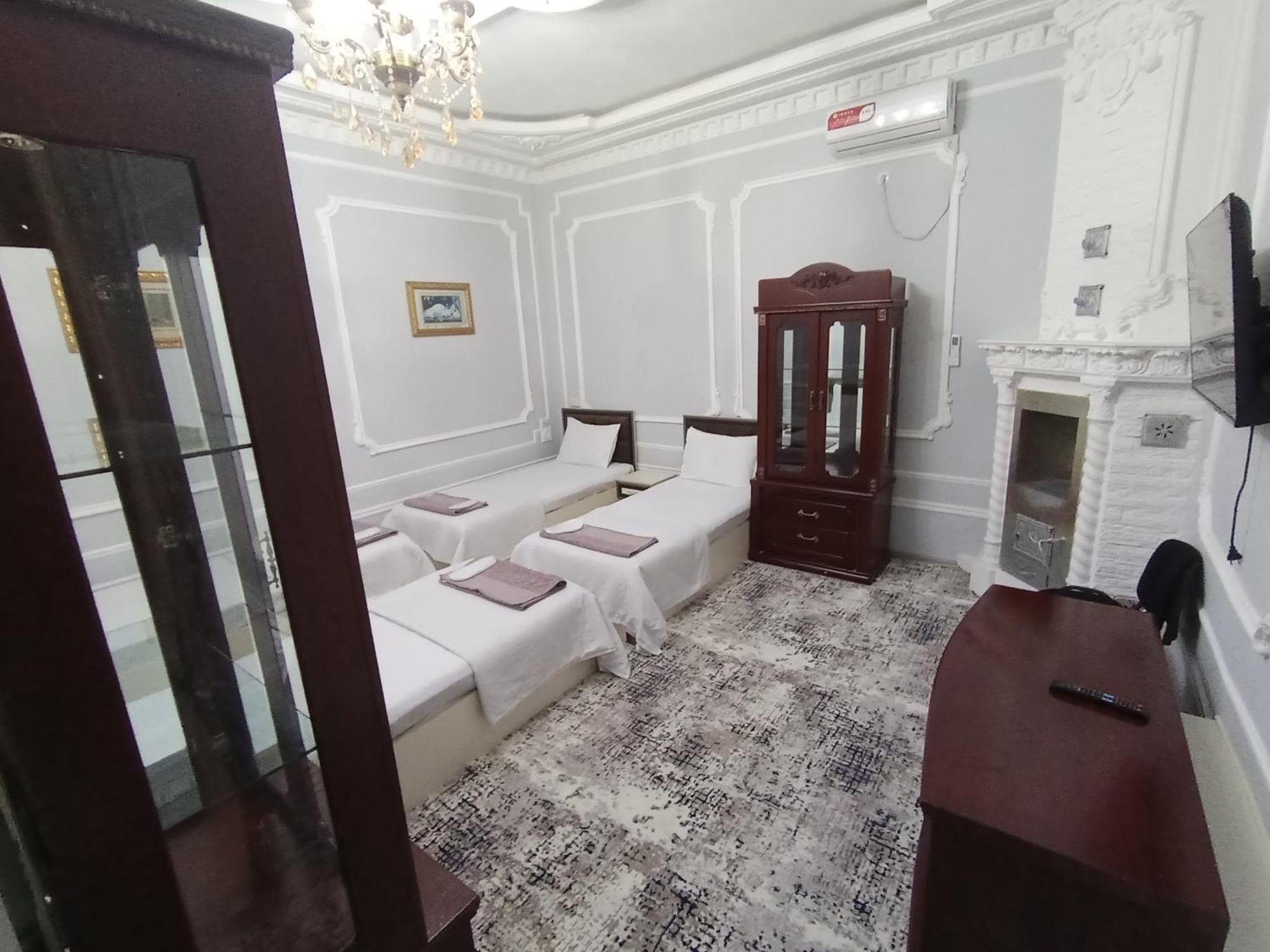 Abubakir Guests House Hotel Самарканд Стая снимка
